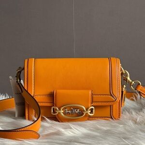 Coach hero crossbody bag in Papaya colour